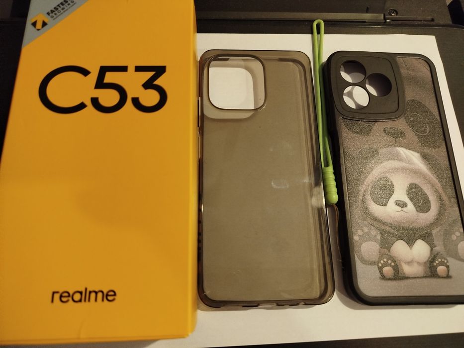 Realme C53 gold,la cutie și 2 huse de protectie,plus smartwatch