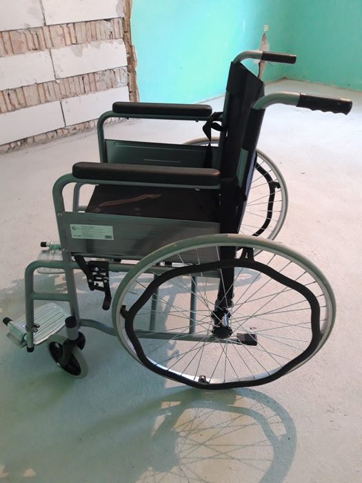 Scaun cu rotile pliabil