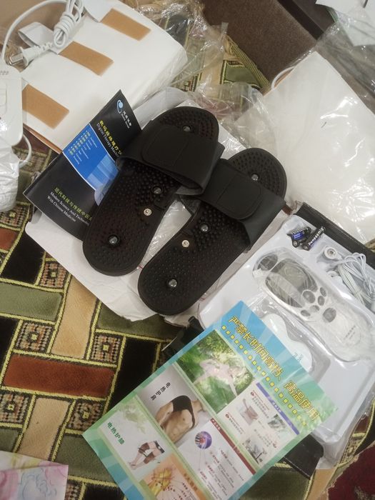 Массажёр для ног с электроподогревом.