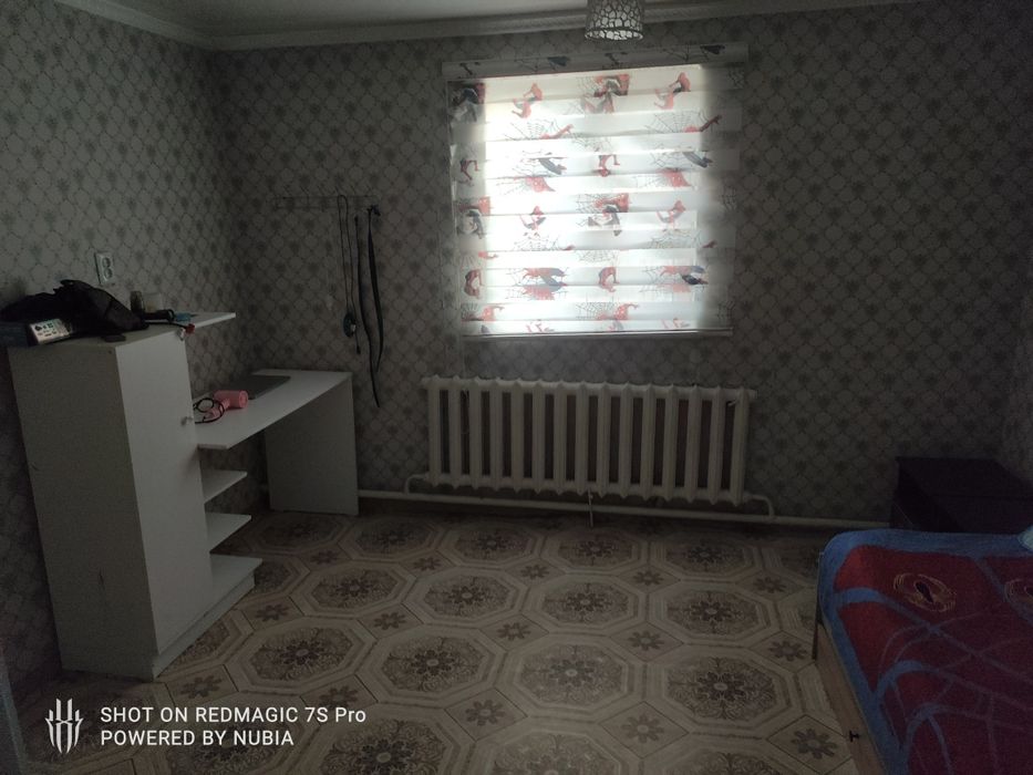 Дом находится за 7 школой