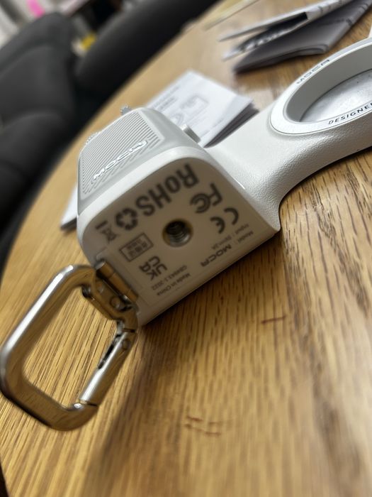 COMITOK MOCA Grip за iPhone – магнитна ръкохватка за снимане