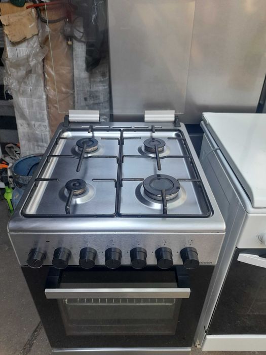 Aragaz Heinner inox-argintiu,cu cuptor electric