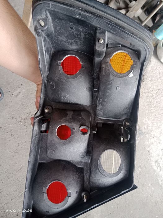Фонарь правый w124 Hella