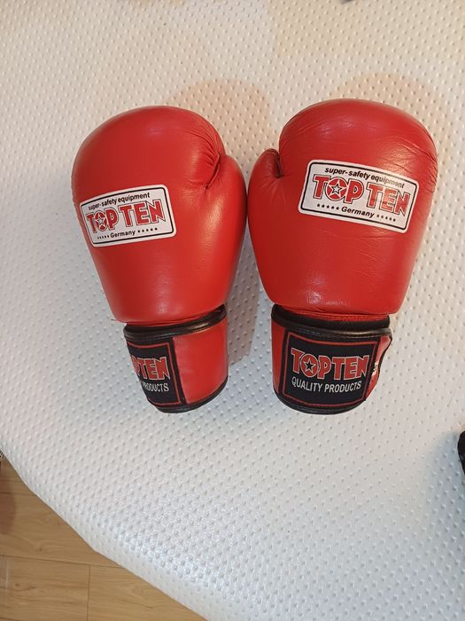 Продам боксерские перчатки TOP TEN