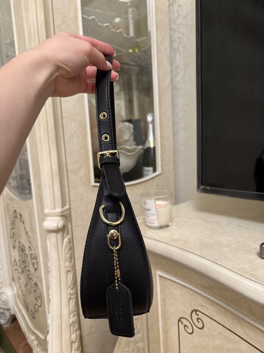 Сумка от бренда Coach