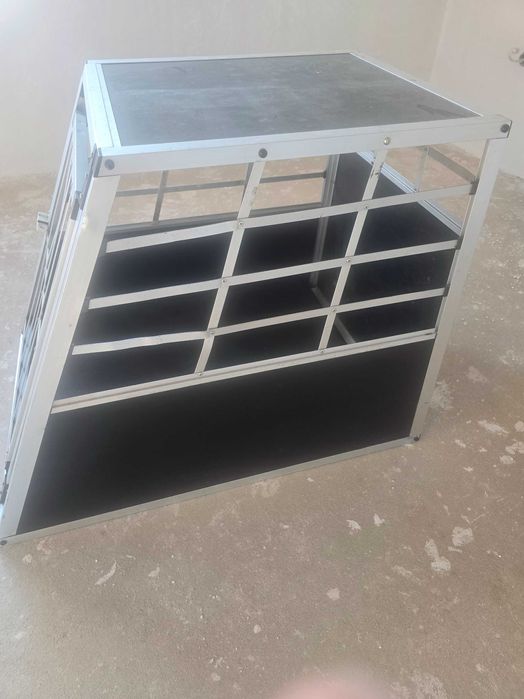 Клетка за транспорт на кучета