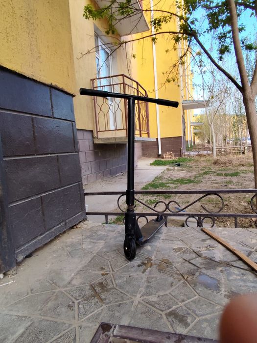 Самокат триковный