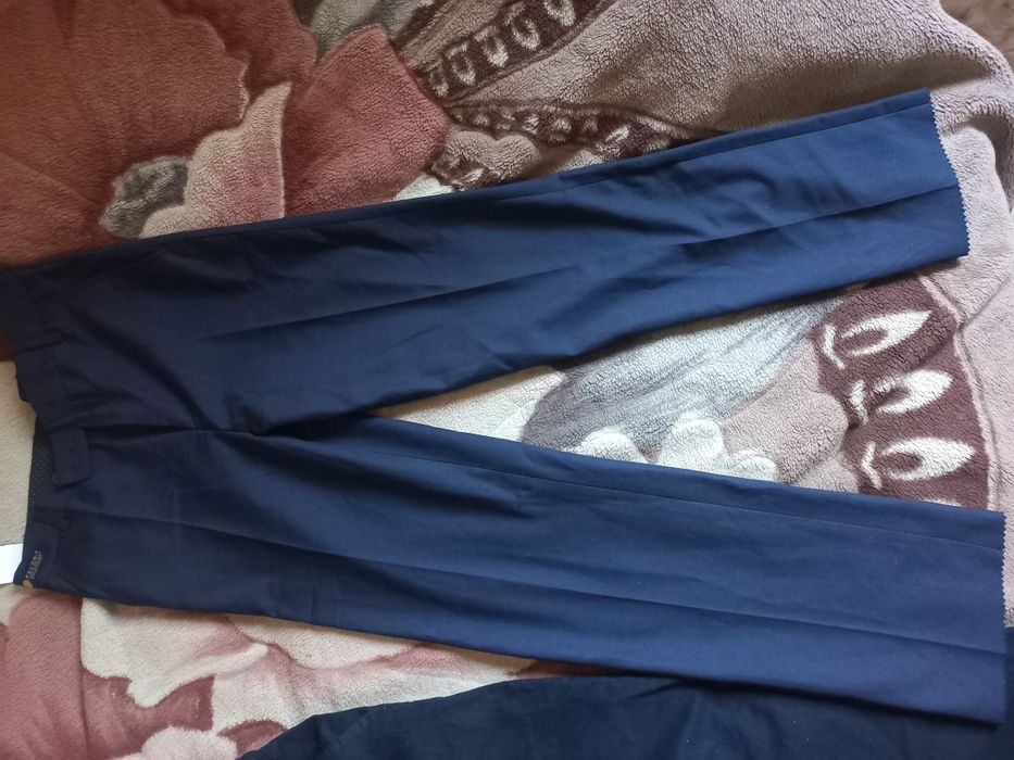 Продам брюки новые