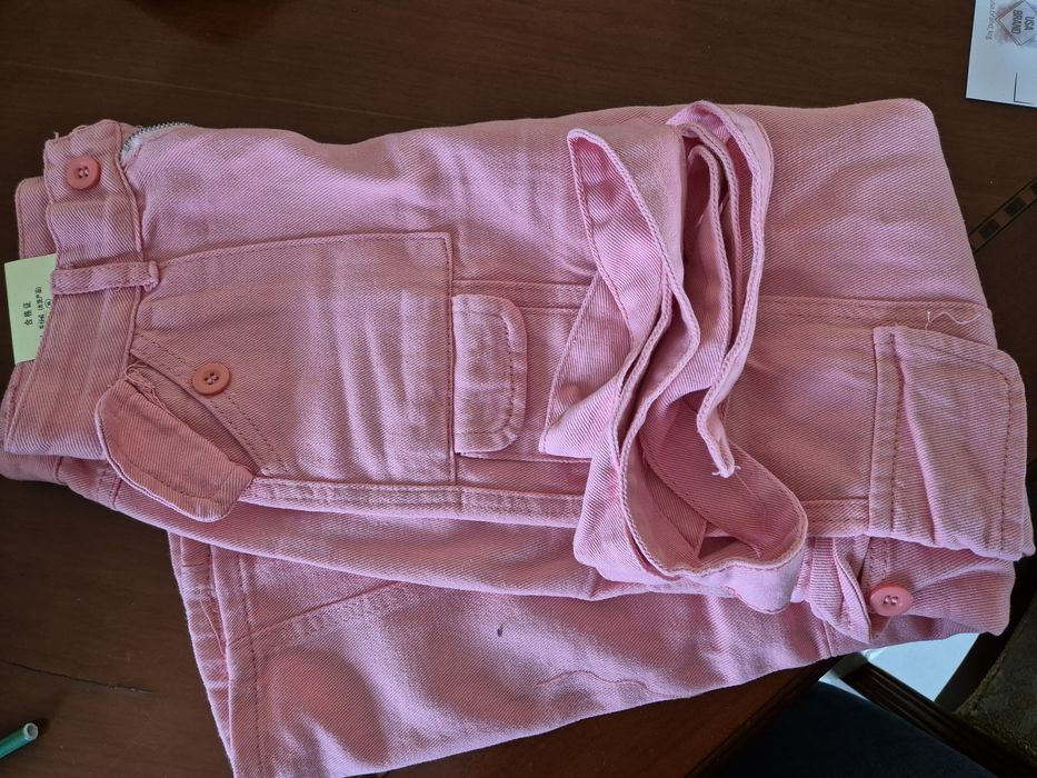 Джинсы новые розовые