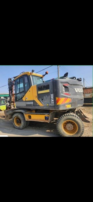 Экскаватор хизмати