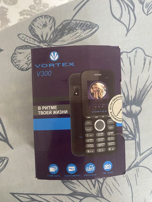 Сотовый телефон Vortex V300