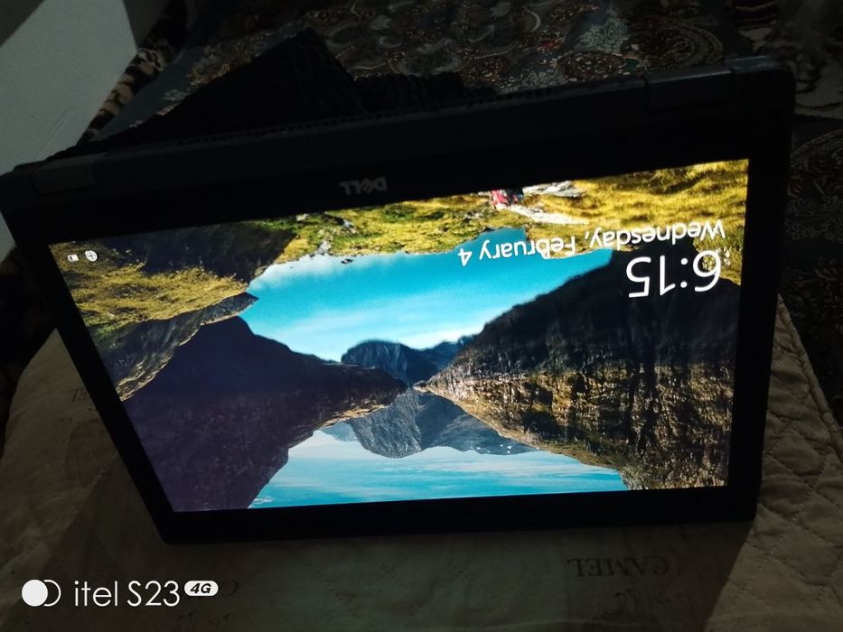 Dell 2 tasi birda noutbuk sotiladi ekran sensor