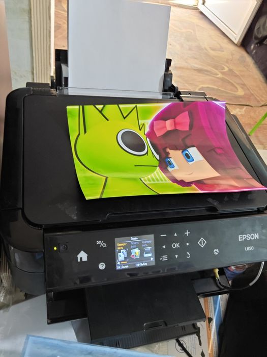 Epson L850 harakatdagi ishlab turgan printer