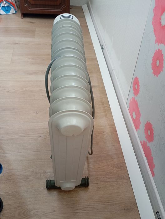 Продам масляный электрообогреватель