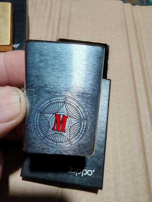 Продам зажигалку зипо