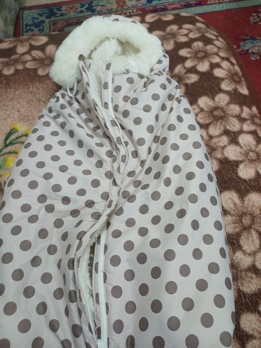 Продам тёплый конверт для выписки.