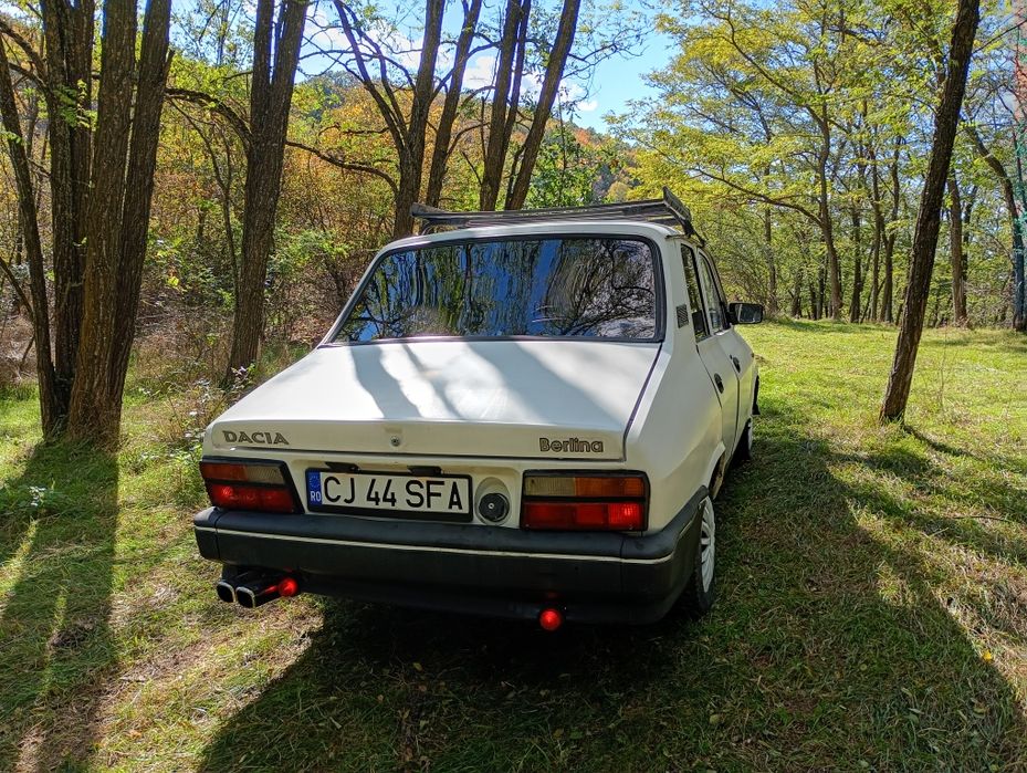 Vand Audi A4 B6 2002    si.  Dacia 1310 din 2004