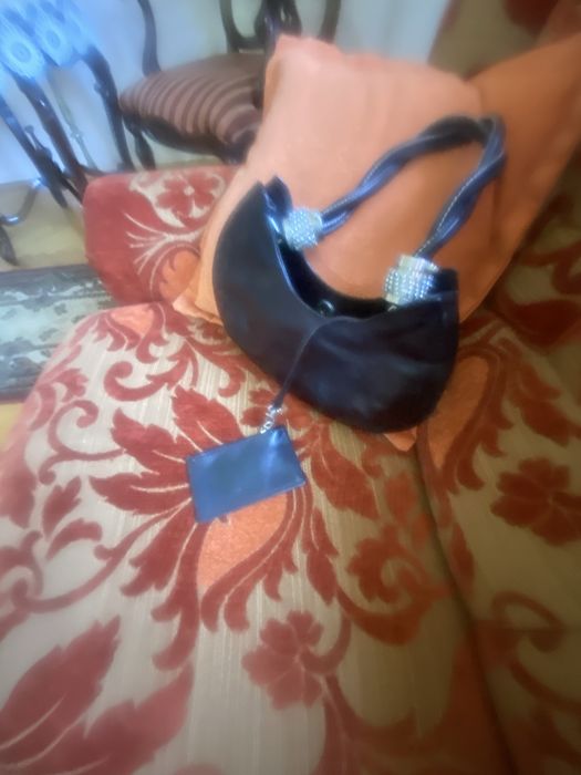 Poseta neagra din piele f eleganta