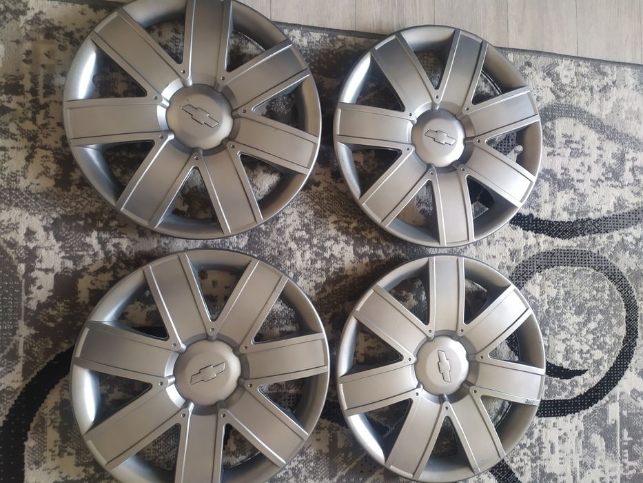 Калпаклар 15 нексия 3 ники, 4 таси янгидай, 2таси б/у, 6 таси 100 минг