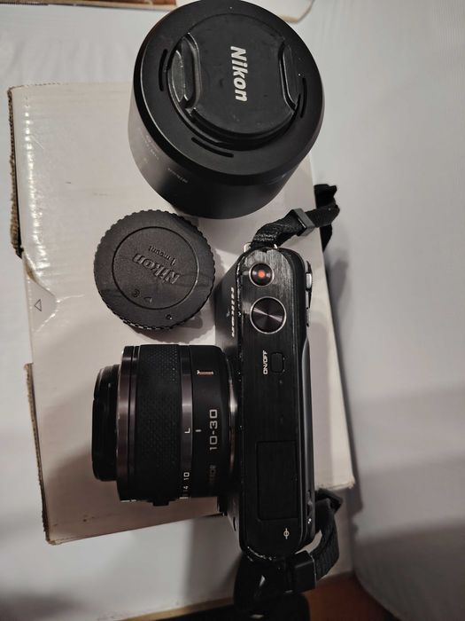 Nikon 1 j 2 с двумя объективами.