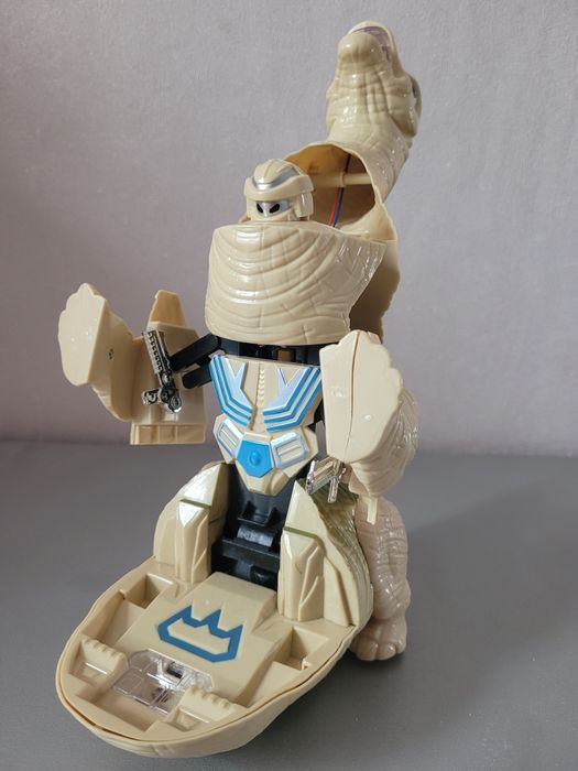 Динозавр робот трансформер