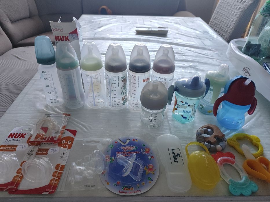 Шишета за адаптирано мляко и гризалки