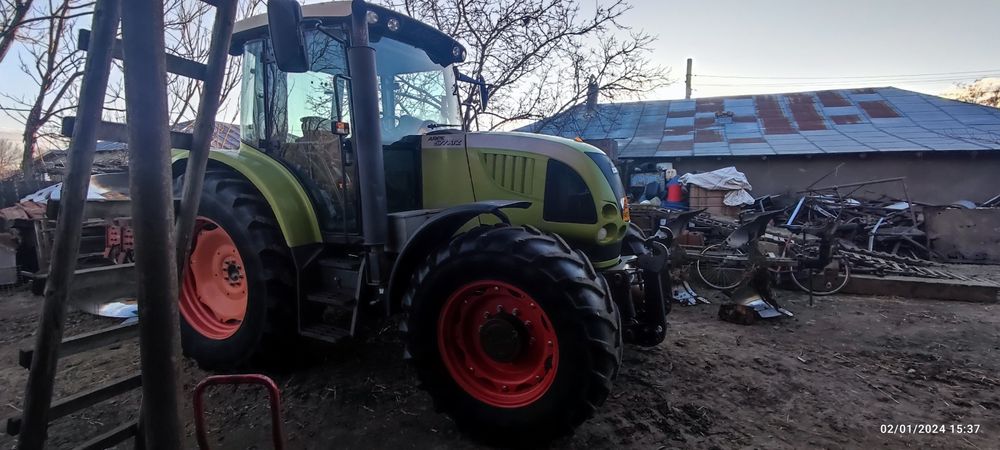 Tractor Claas Ares 577 ATZ + plug