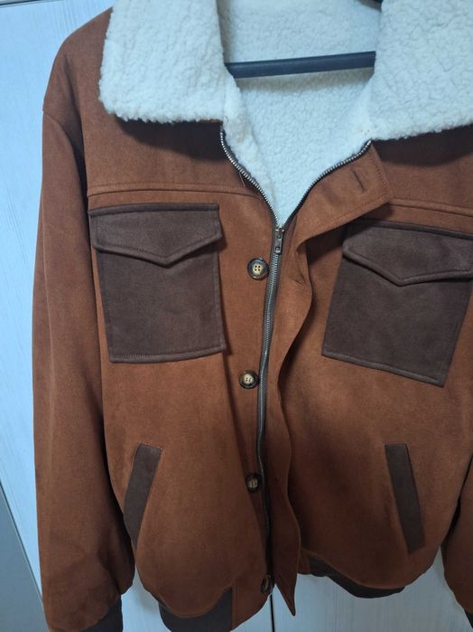 Продавам мъжко яке,чисто ново