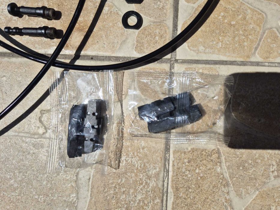 Set frane hidraulice Magura HS11-EVO2, inclusiv 2 perechi saboti noi