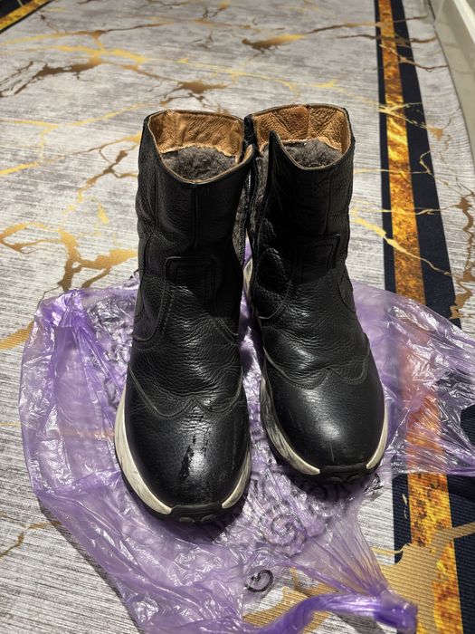 Продам кожанный обувь сапоги