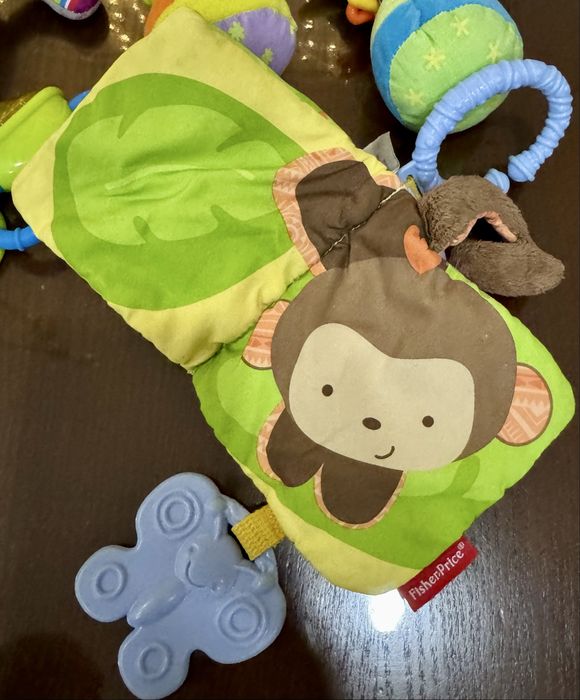 Подвесные игрушки в коляску манеж