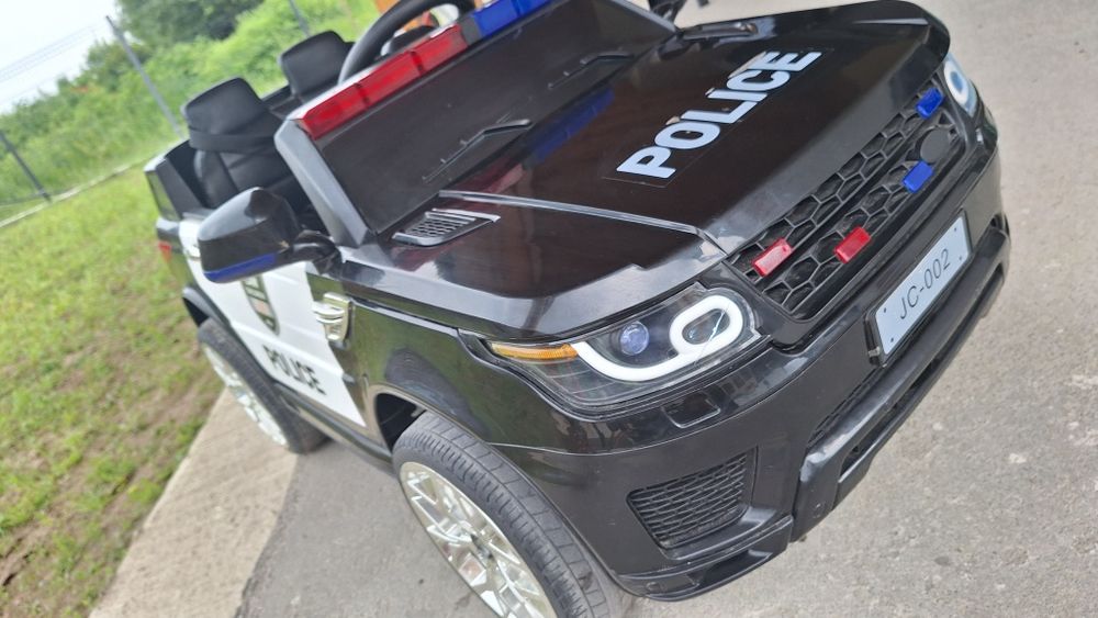Masinuta de politie cu girofar NOVOKIDS 2-7 ani, cu telecomanda,USB,muzica, 2 motoare