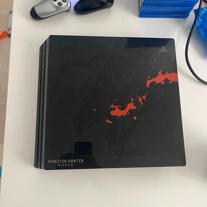 PS4 Pro 1TB + 3 manete originale + 21 jocuri – Pachet complet