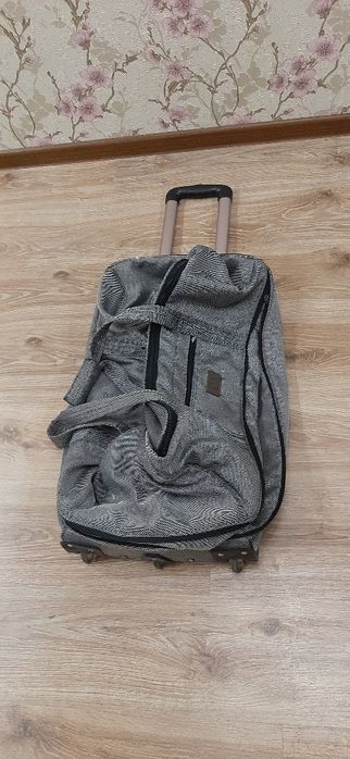 Дорожная сумка на колесиках