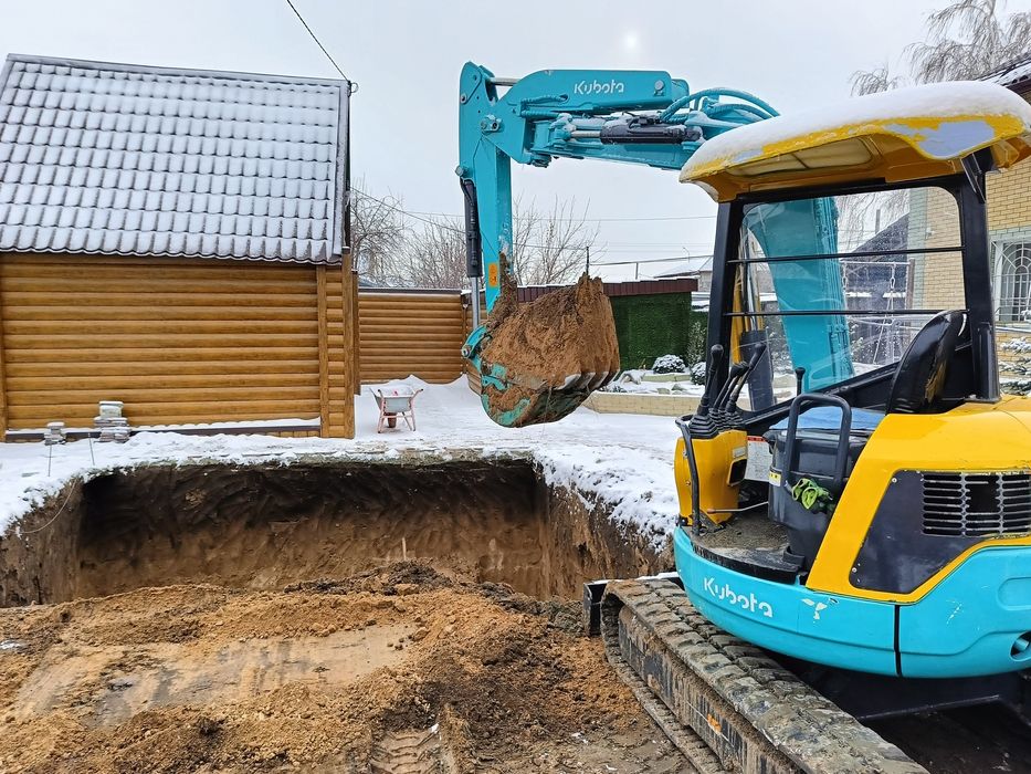 Услугами экскаватор