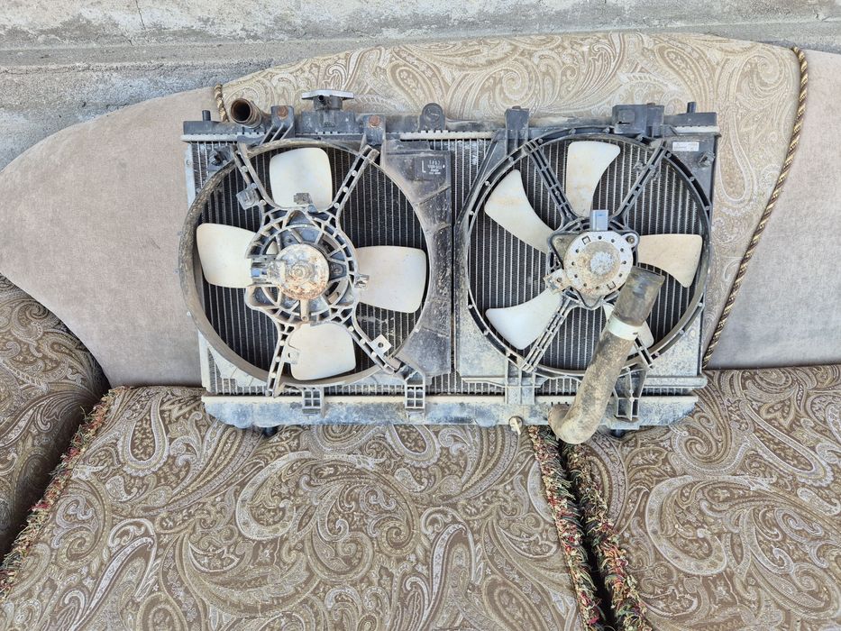 Радиатор на мазда премаси