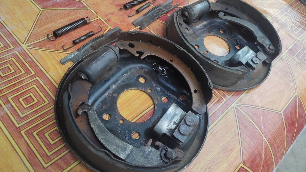 Задние барабанные тормоза и передние кулаки 2114