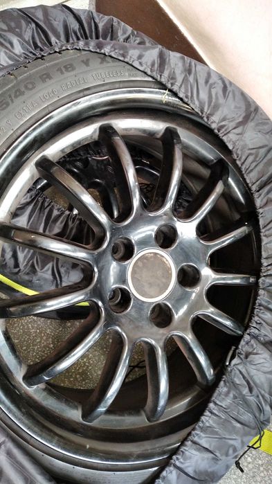 Jante aliaj 4 buc + anvelope Continental R18 225/40 vară Golf 5 sau...