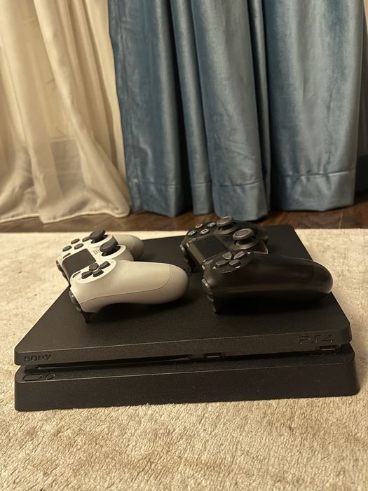Ps4 Slimp impecabil cu 2 manete, incarcator si 14 jocuri