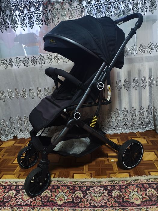 Продам  прогулочную коляску Teknum