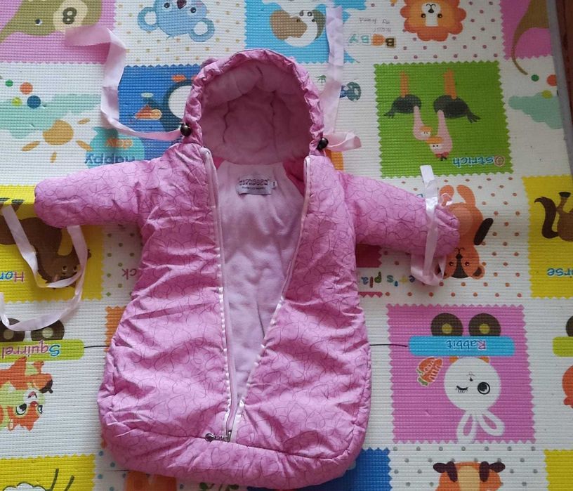 Продам детские  комбинезоны