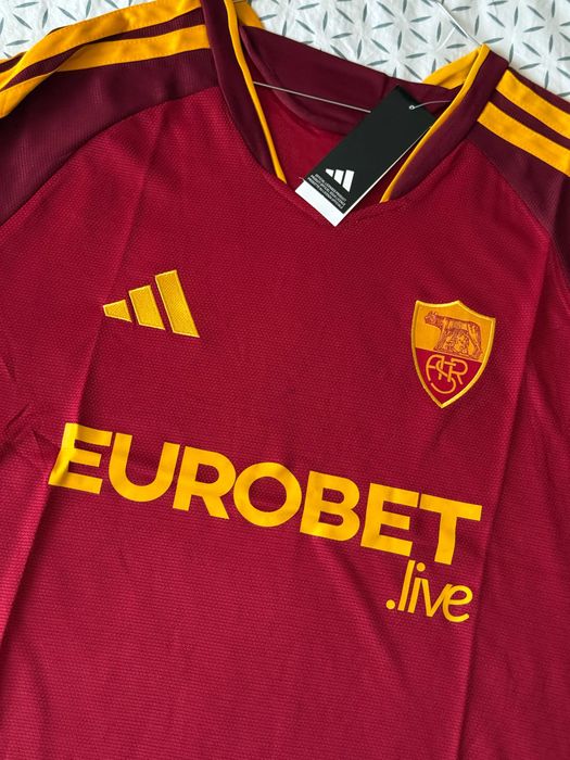 Tricou Roma home rosu 2026-2027 sezonul nou cu badge champions league
