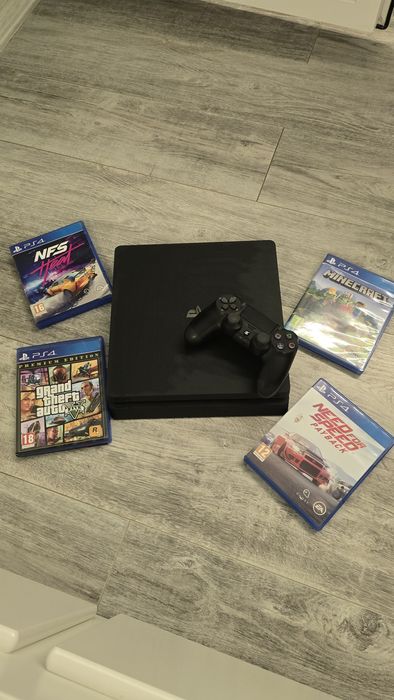 PS 4 Slim +manetă originală + 5 jocuri