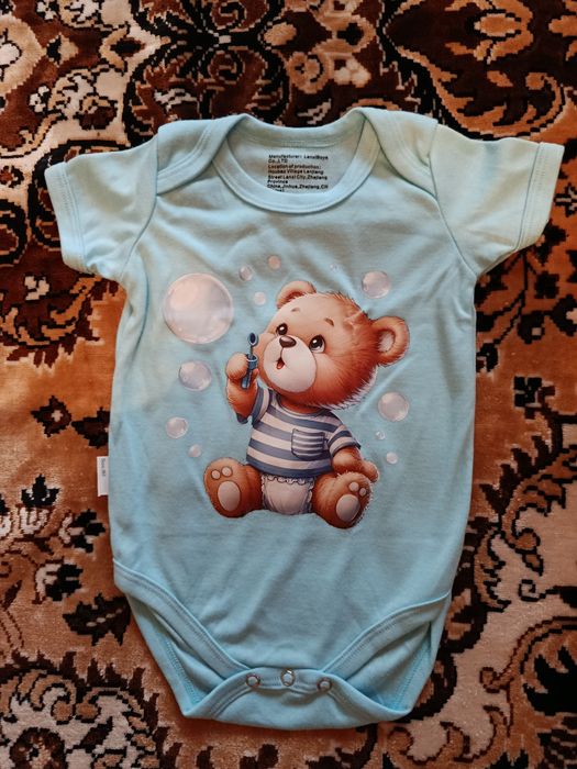 Продам боди новые от 6 месяцев до года