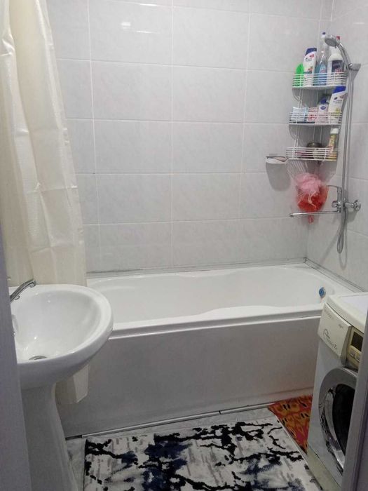 Янги хайот Спутник 16а дан 2 хонали 63 кв. квартира сотилади