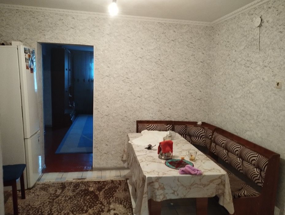 Продам дом в центре Ащибулака