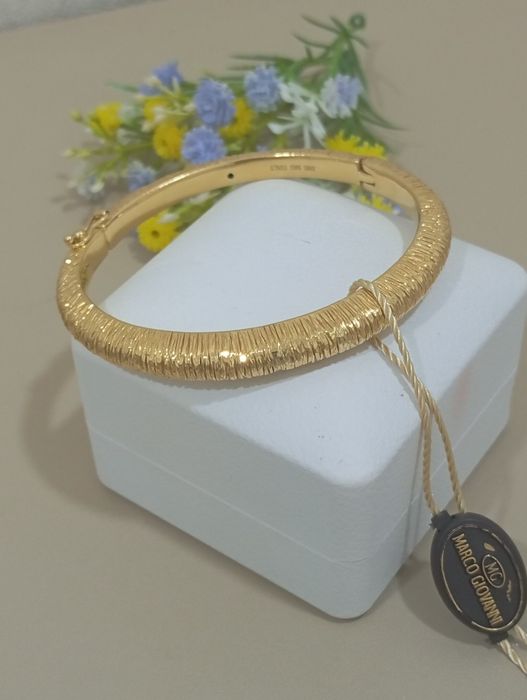 Золотой браслет от Марко Жаванни