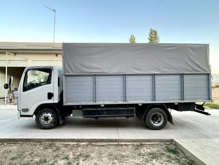ISUZU Бортовой с тентом