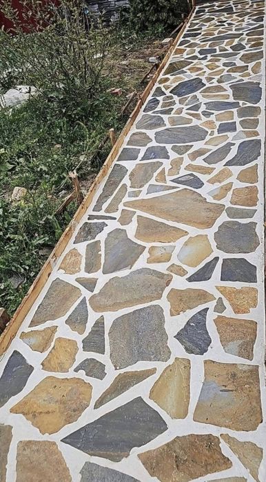 Vand si montez piatra naturala de grecia  ma deplasez in toata tara