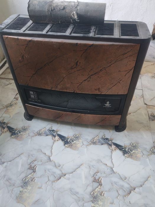 Продам газовый камин , печь